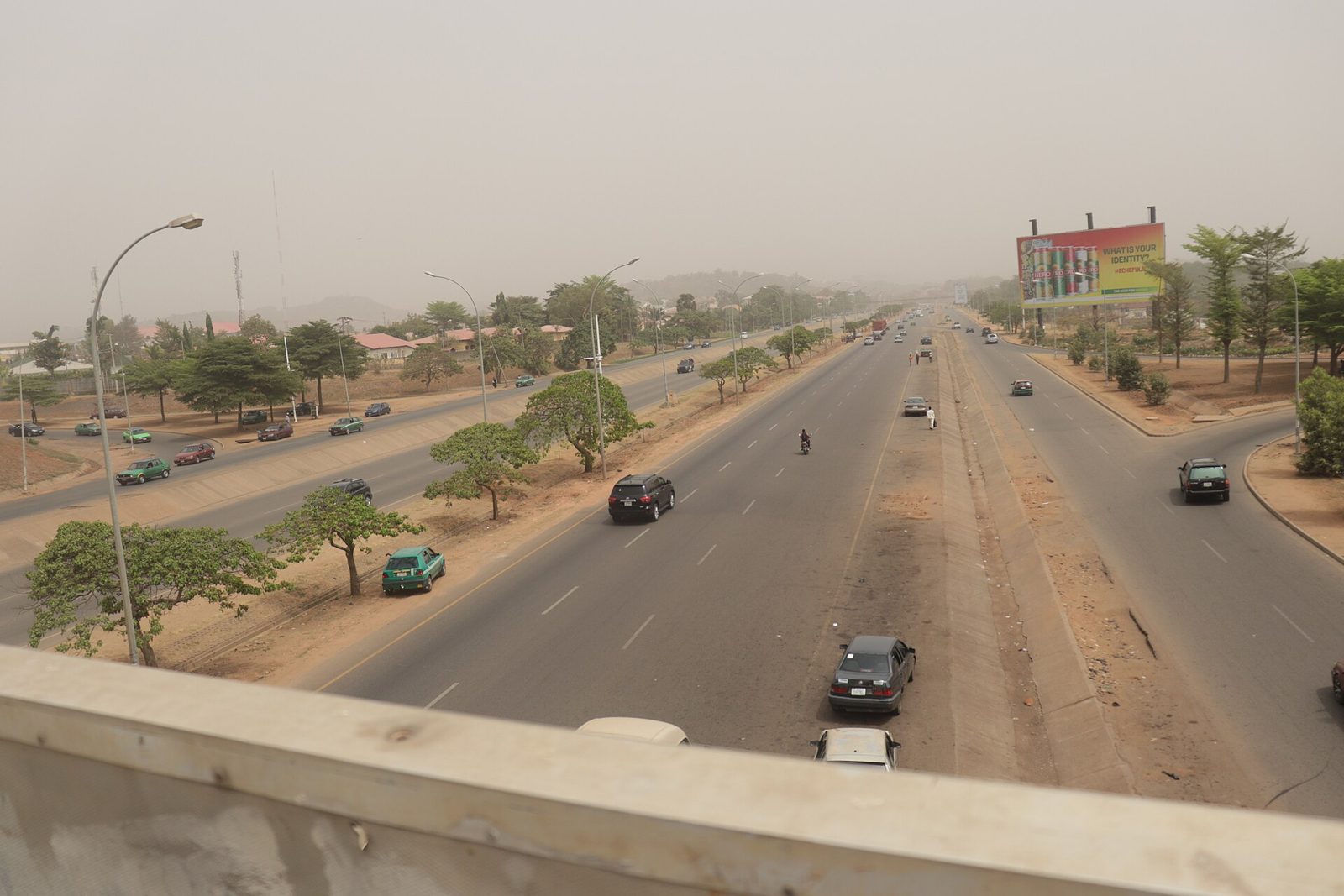 Abuja highway in harmattan haze